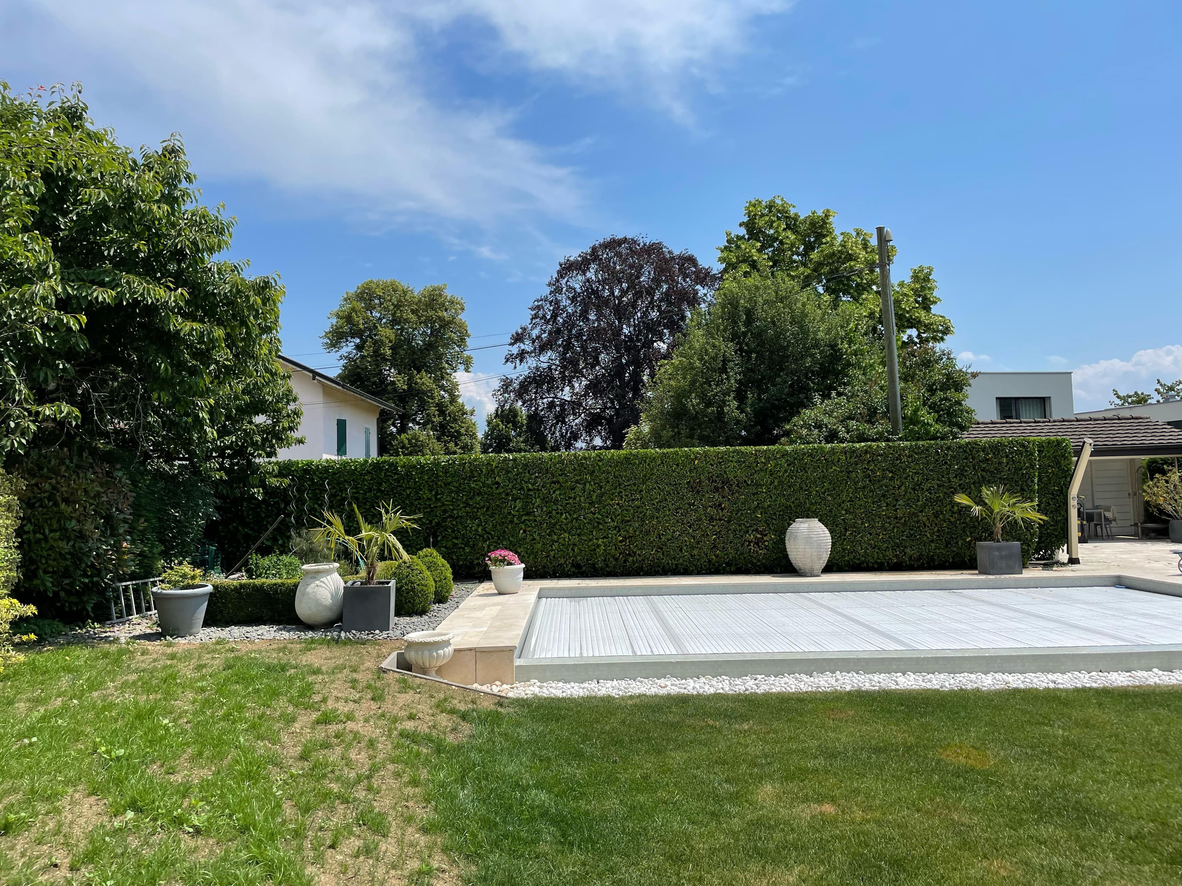 Aménagement jardin avec piscine - Création paysagère bio Suisse romande
